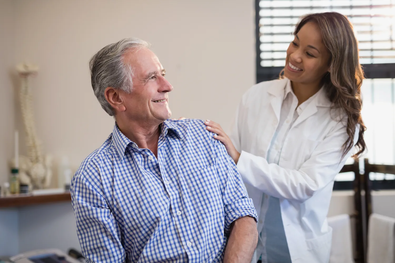 smiling-female-therapist-looking-at-male-patient-a-2025-04-05-04-26-47-utc